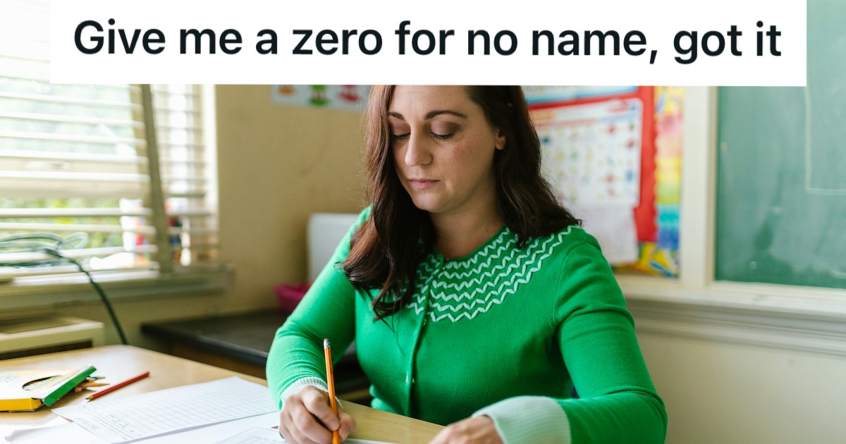 Teacher marking papers on her desk