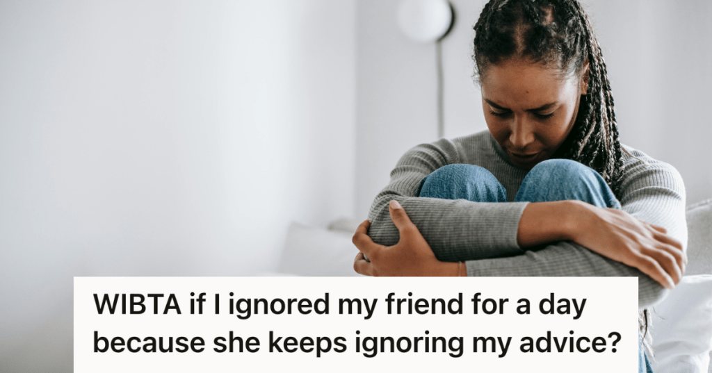 upset young woman sitting in bed