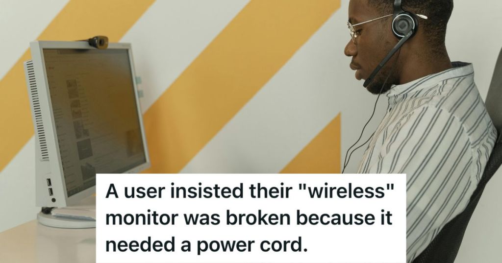 Man with headset looking at his computer screen