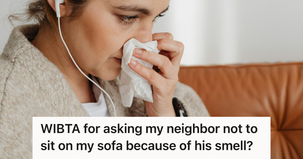woman covering her nose on the couch