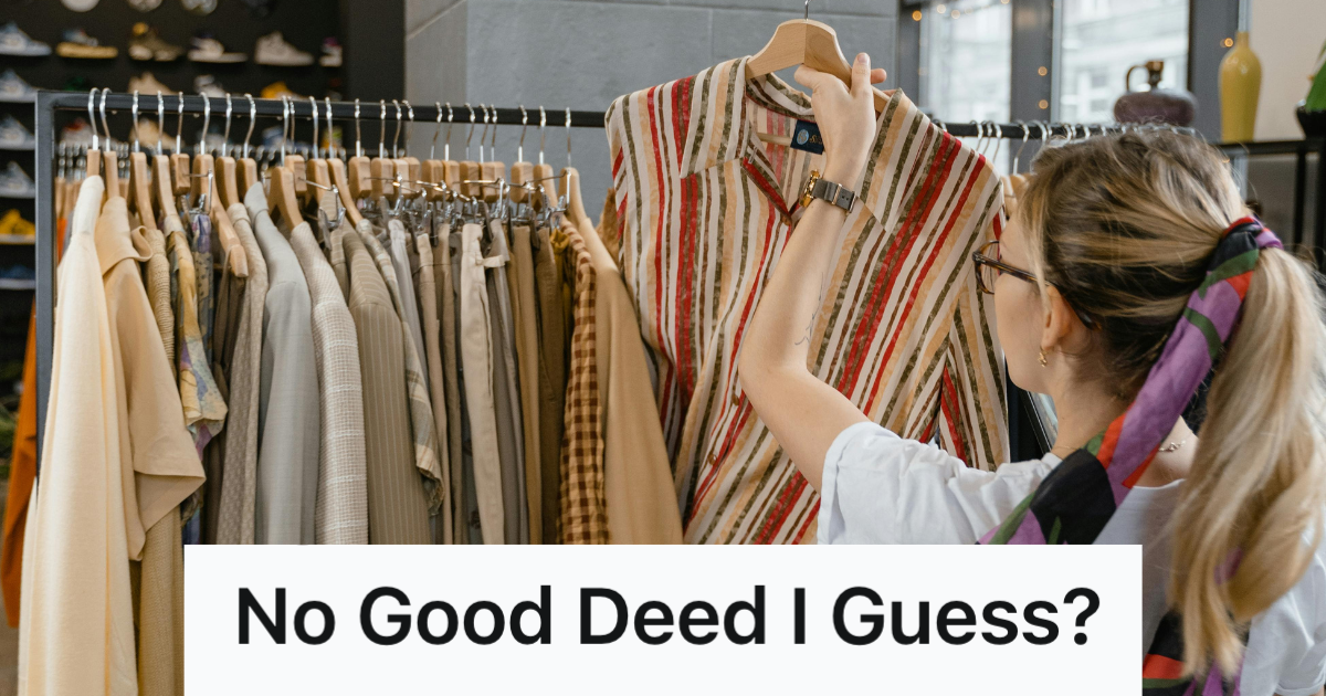 woman looking through a clothing rack