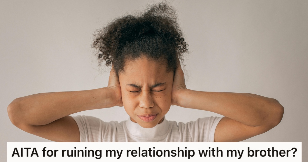 A teen with her hands over her ears