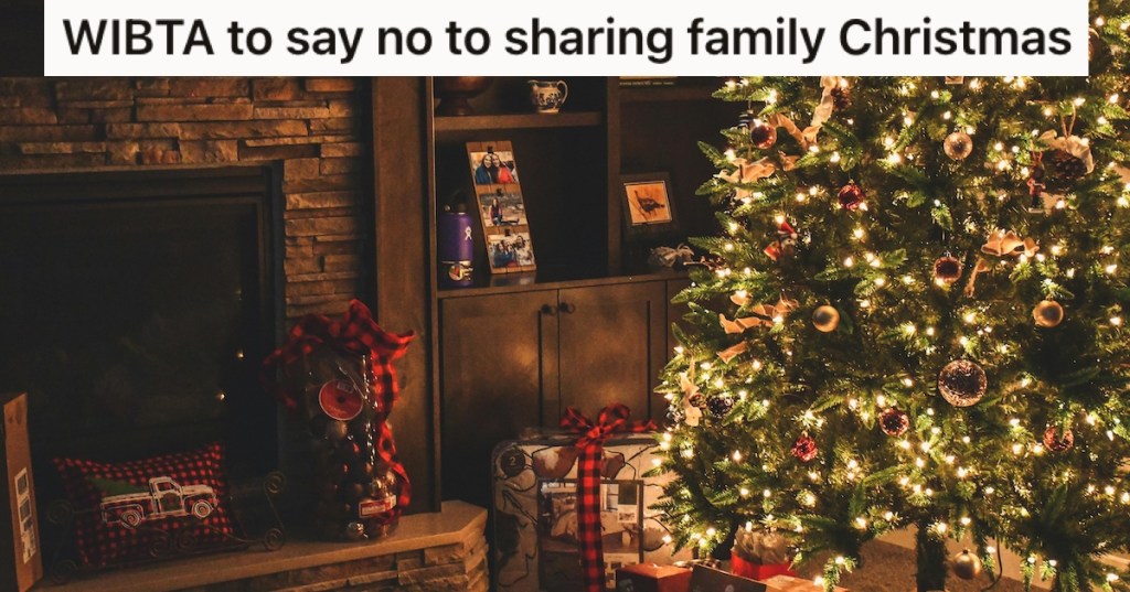 A Christmas tree by a fireplace