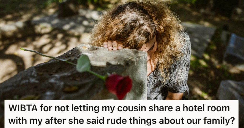 A grieving woman touching a headstone