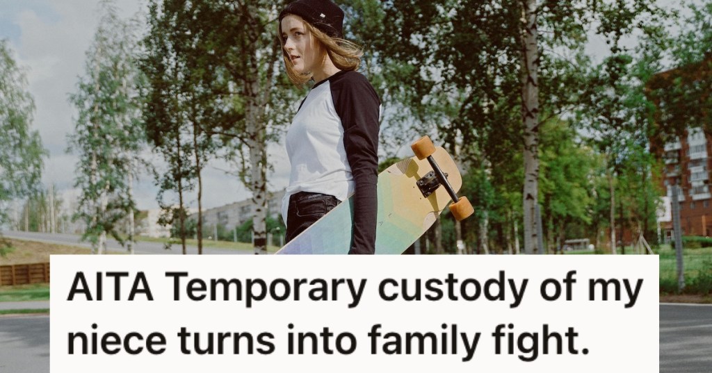 A teenage girl with a skateboard