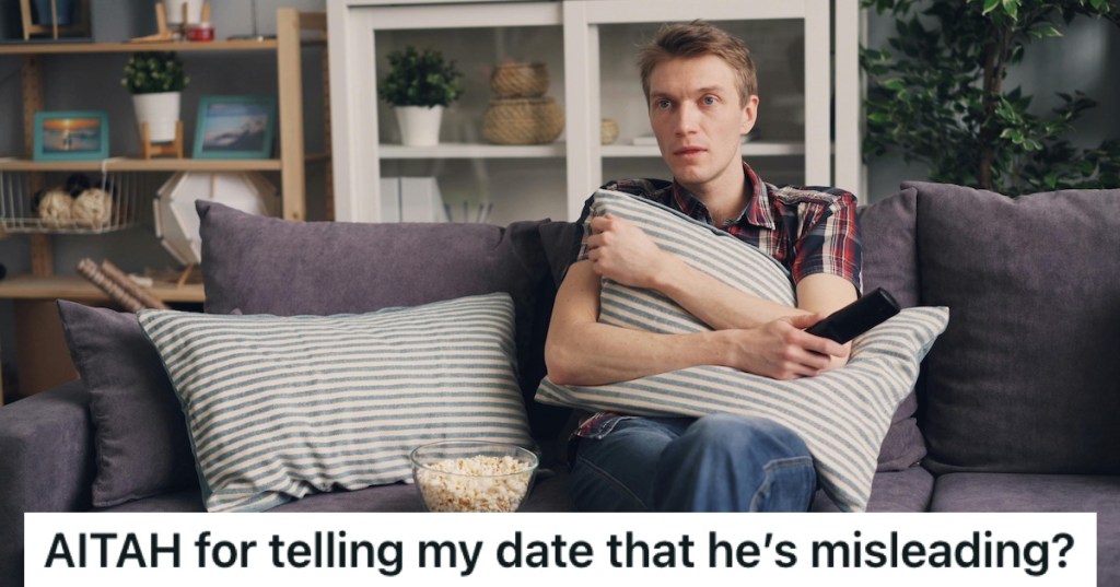 A man on a couch watching TV