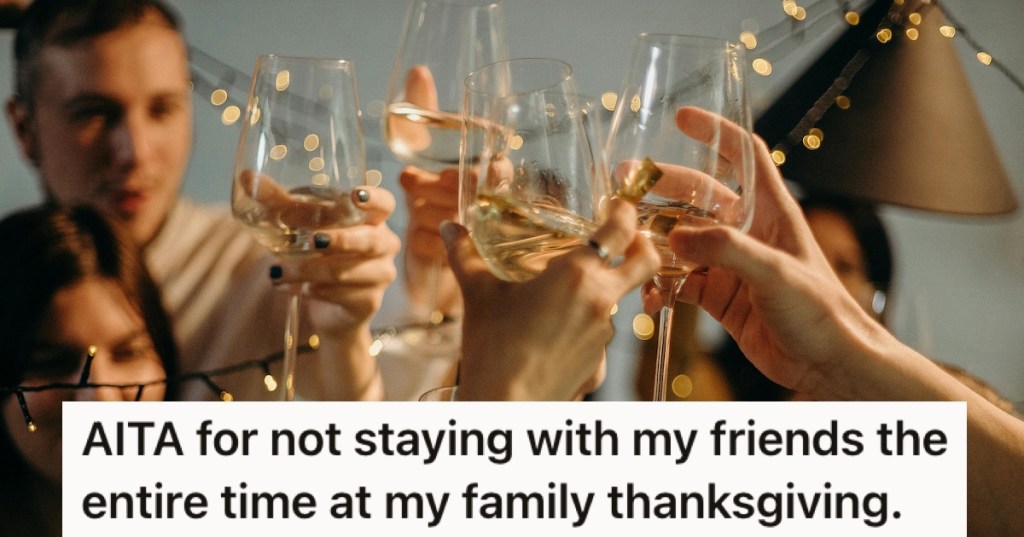 Raised glasses clinking together