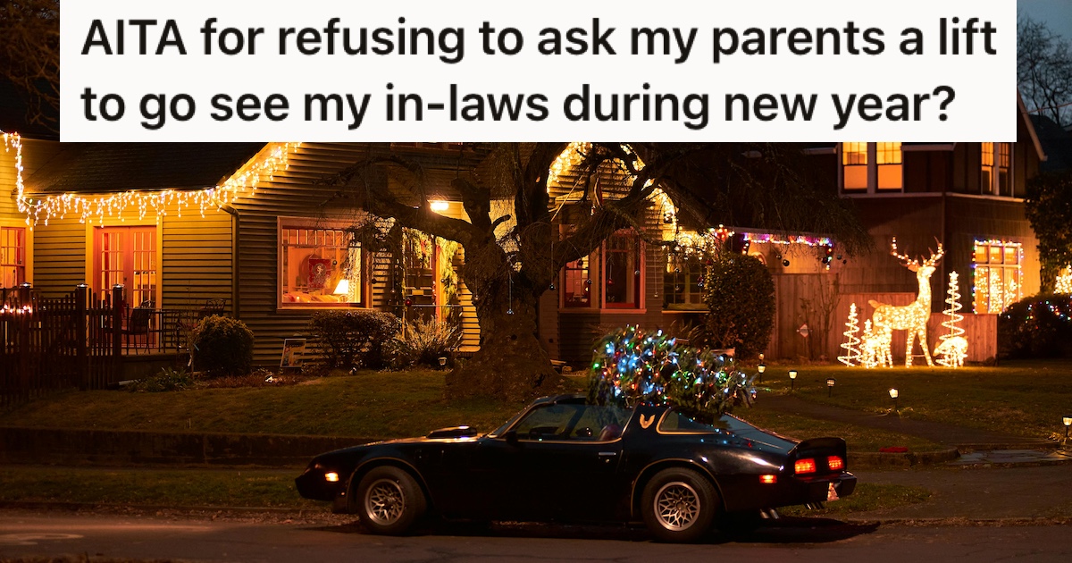 A car with a Christmas tree on top outside a house covered in lights