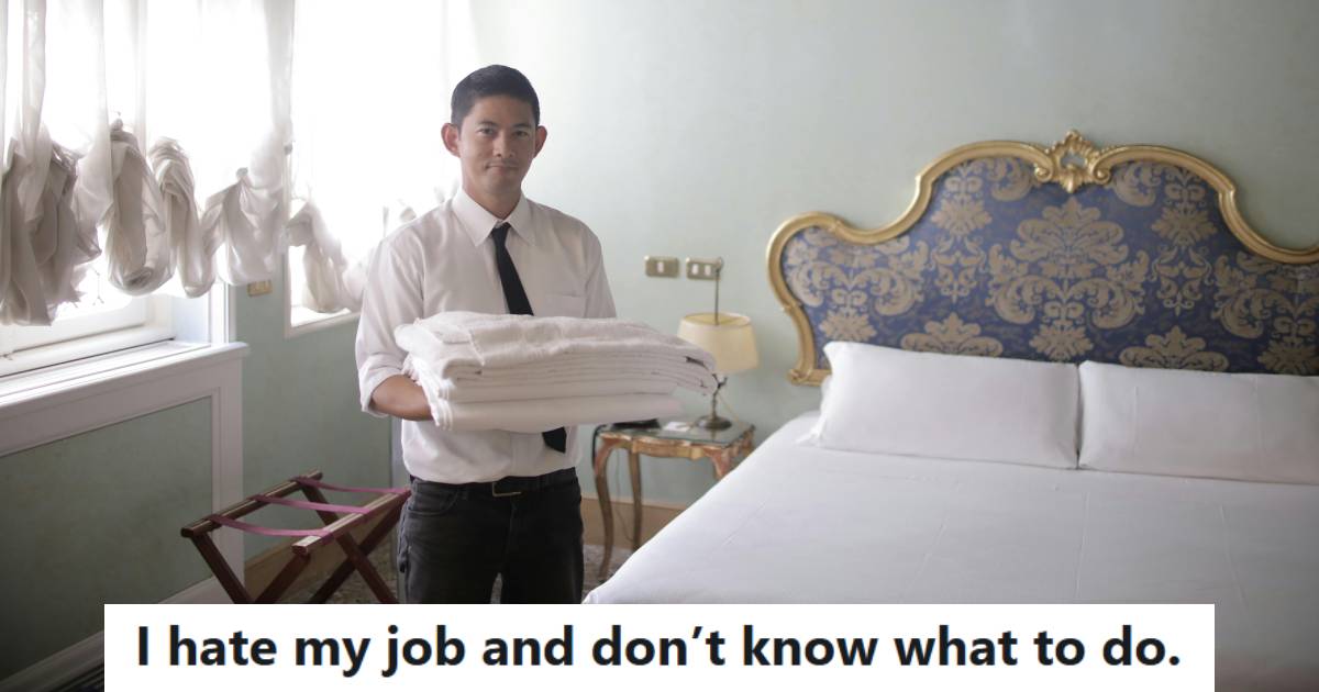 Man standing in a hotel room thinking about how he doesn't like cleaning