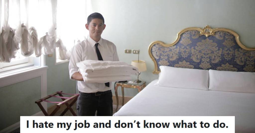 Man standing in a hotel room thinking about how he doesn't like cleaning
