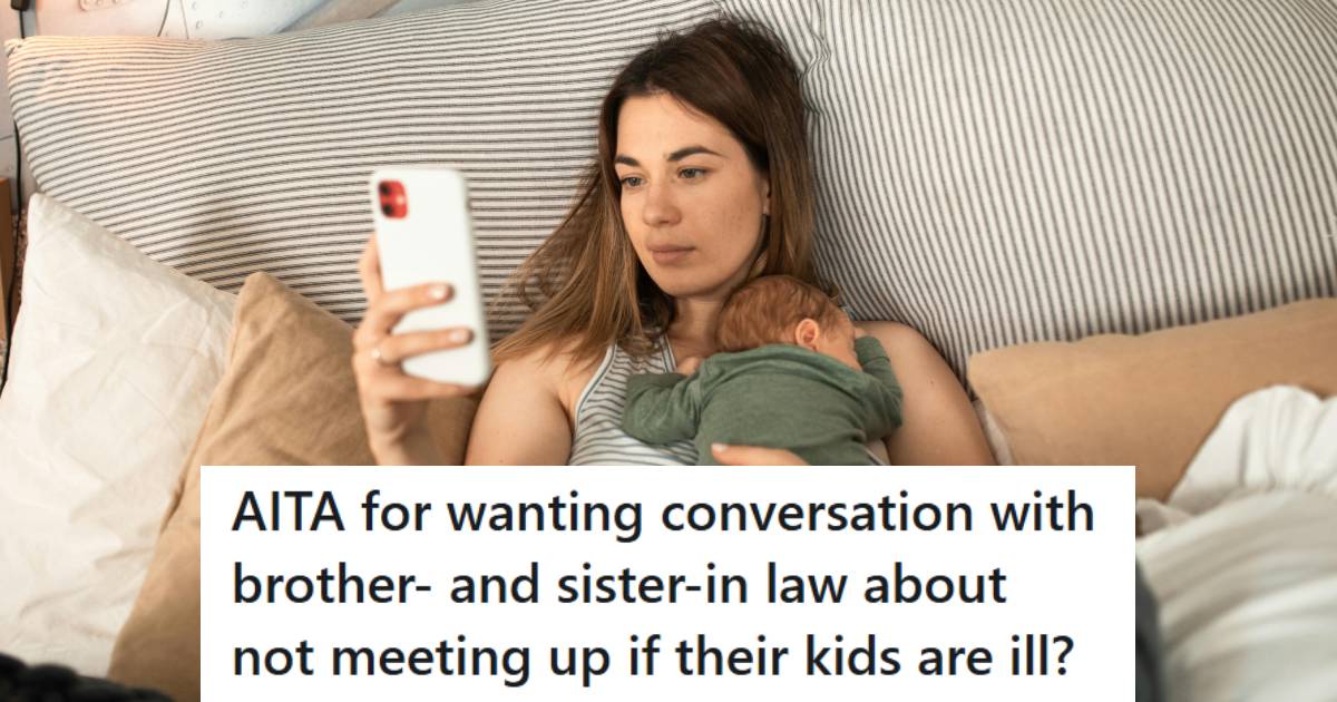 Mother laying in bed holding her newborn and texting family