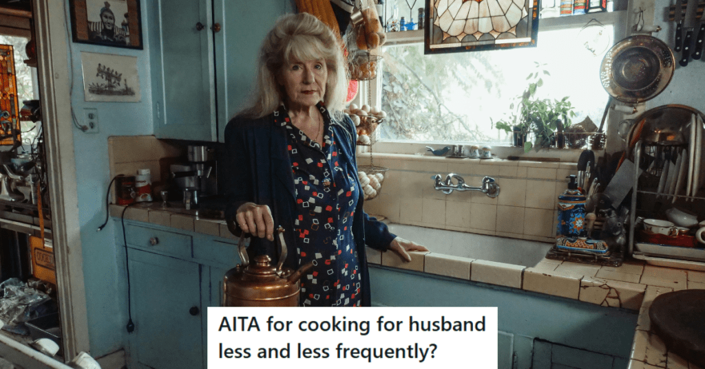 Old woman standing in a kitchen holding a kettle