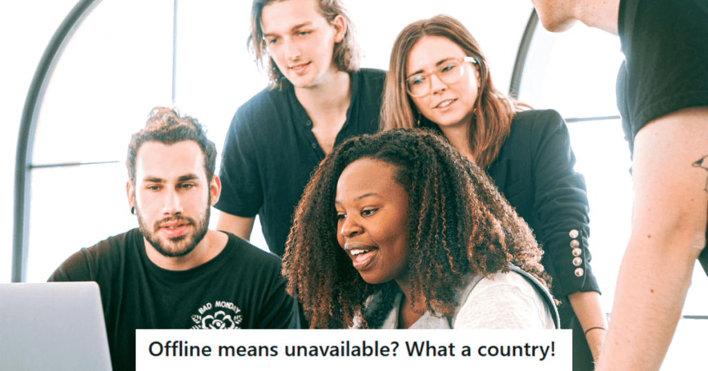 Group of people working on a laptop