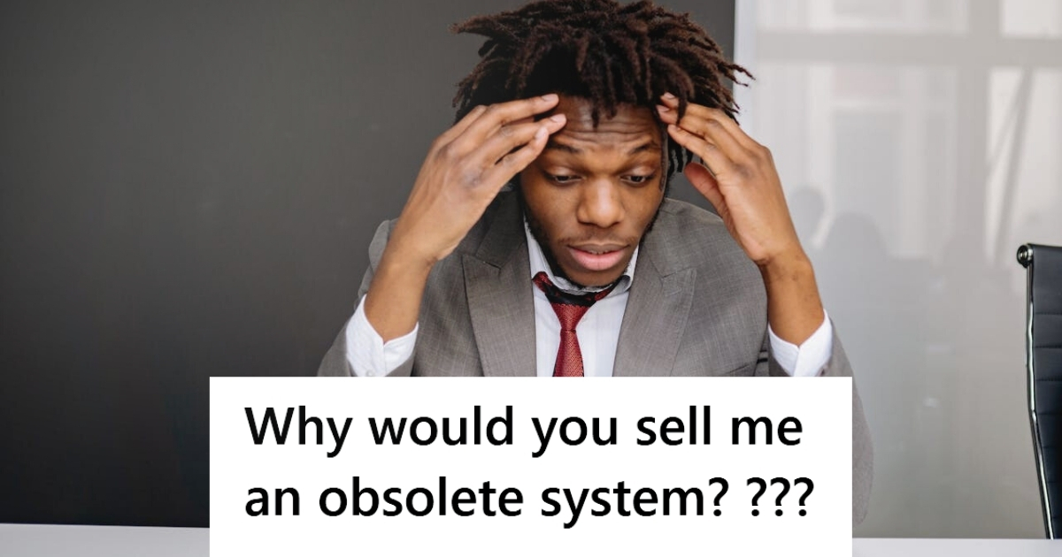 Man facepalming at work