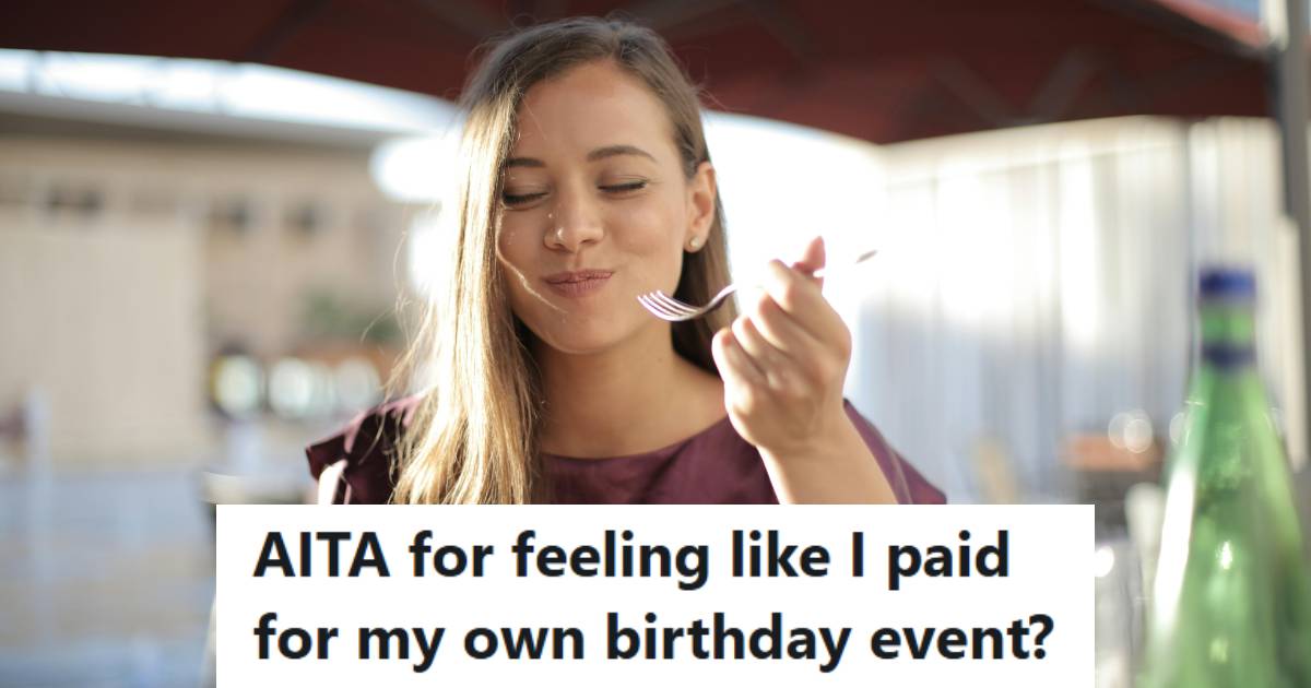 Woman enjoying a birthday dinner at a fancy restaurant with friends
