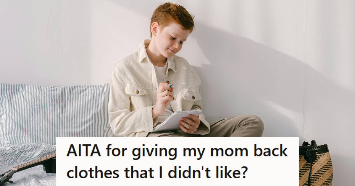 Red-headed kid sitting on his bed writing in his journal