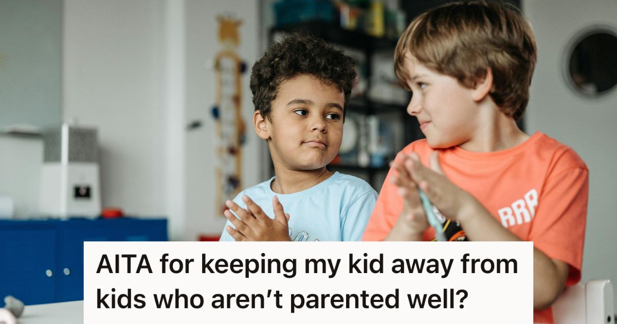 Two young boys playing sitting at a table
