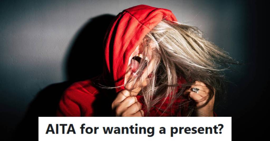 Woman holding her hood over her head and screaming out of frustration