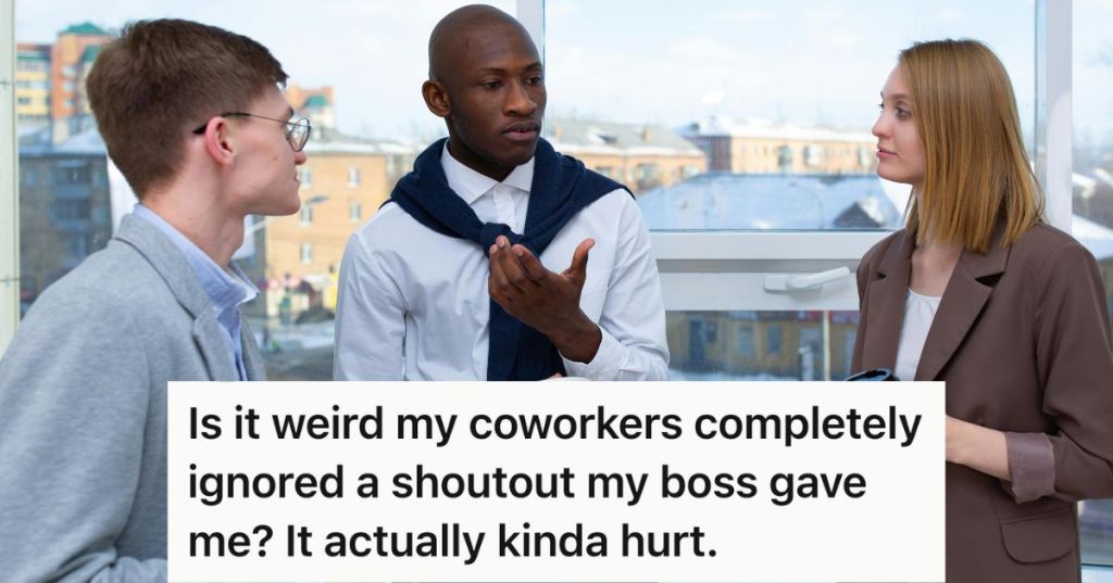 Three coworkers talking at the office