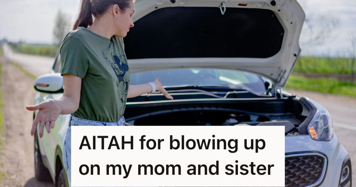 Confused woman looking at the engine of a broken car