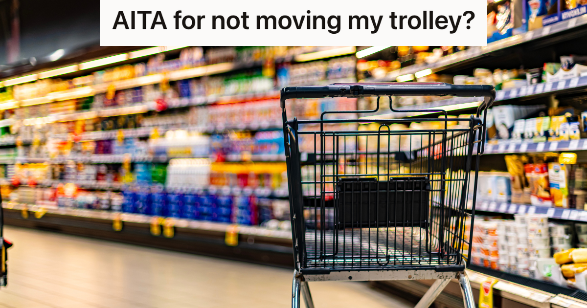 black shopping cart near a grocery store shelf