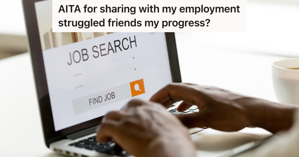 closeup of man's hands typing on laptop that's screen reads "job search"