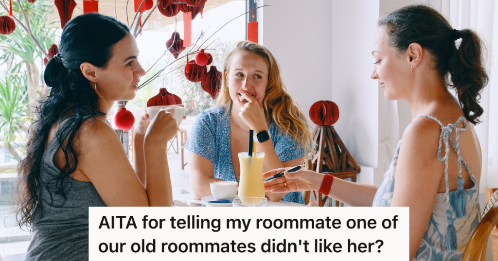 three women sitting at a table talking