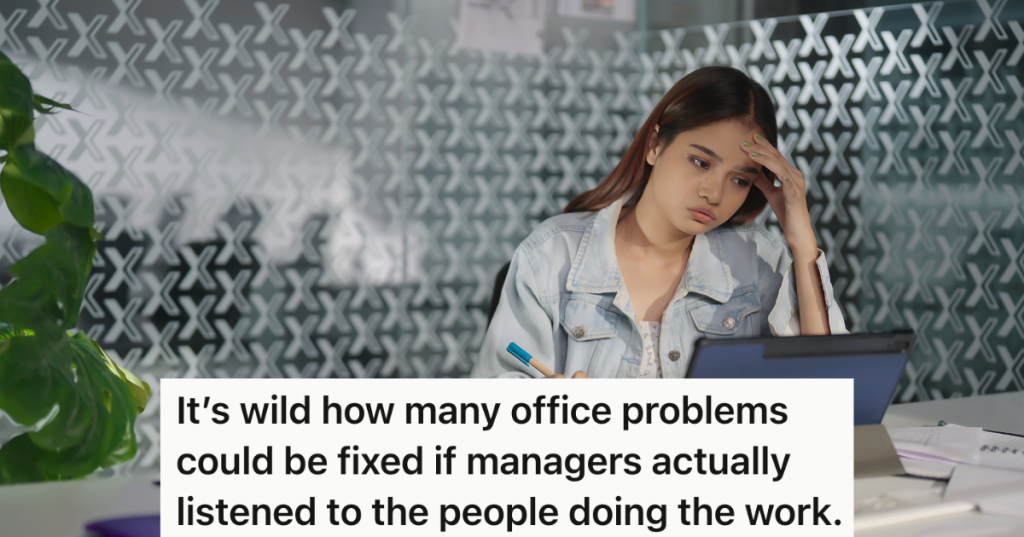 frustrated woman sitting at desk at work