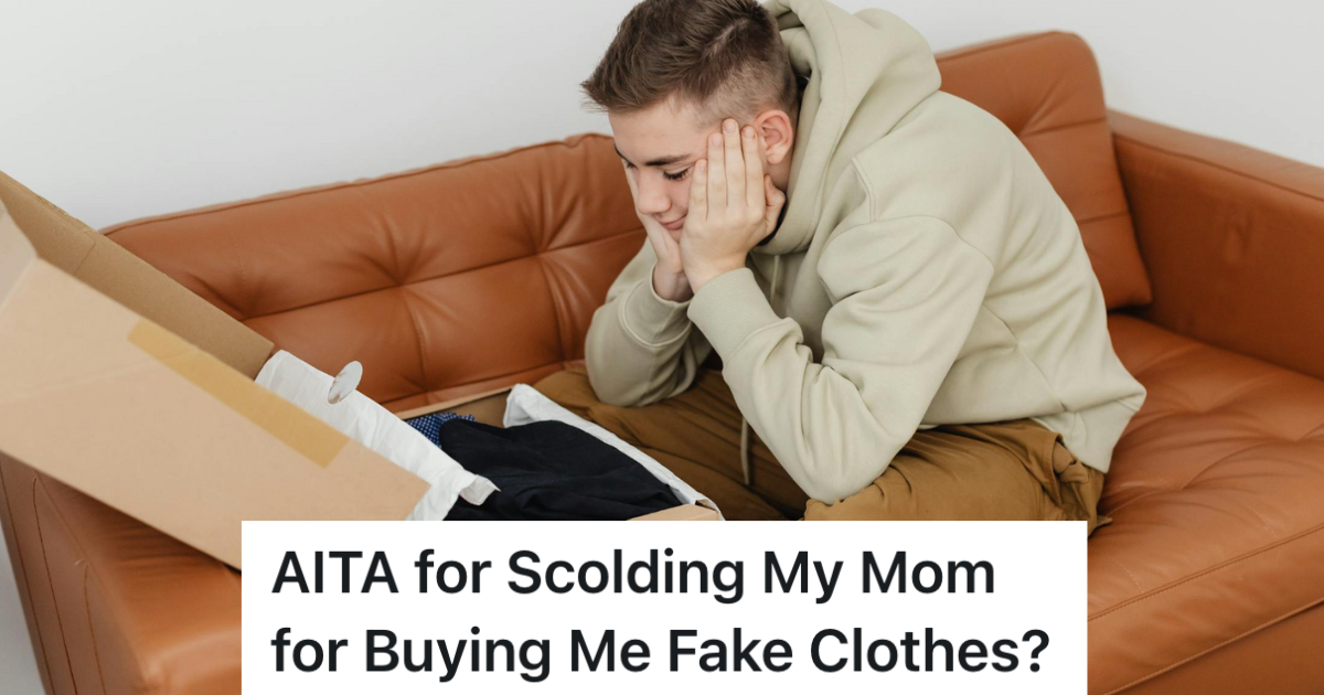 sad teenage boy looking in box