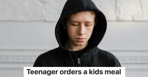 sad teenage boy in black hoodie