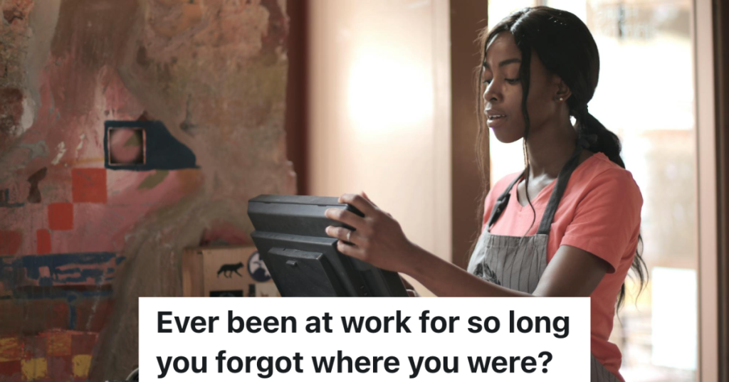 female cashier looking at register