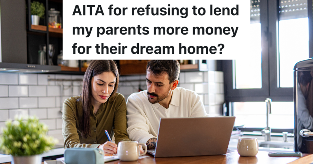 couple looking at bills, laptop and calculator