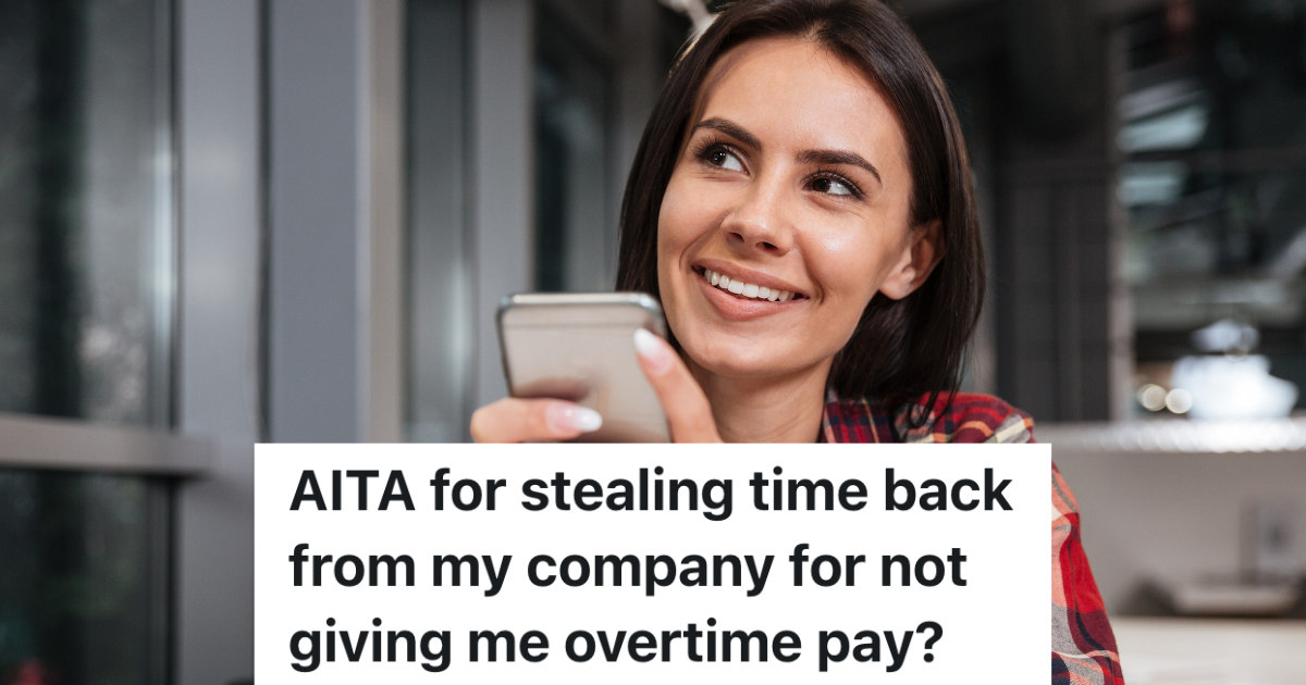 woman holding her phone and smiling at work