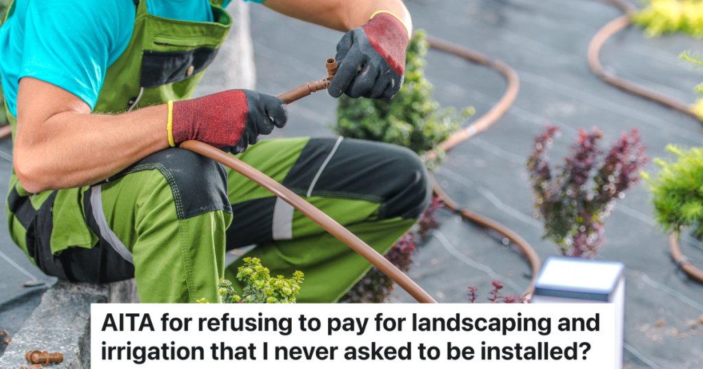 landscaper installing irrigation system in flowerbed