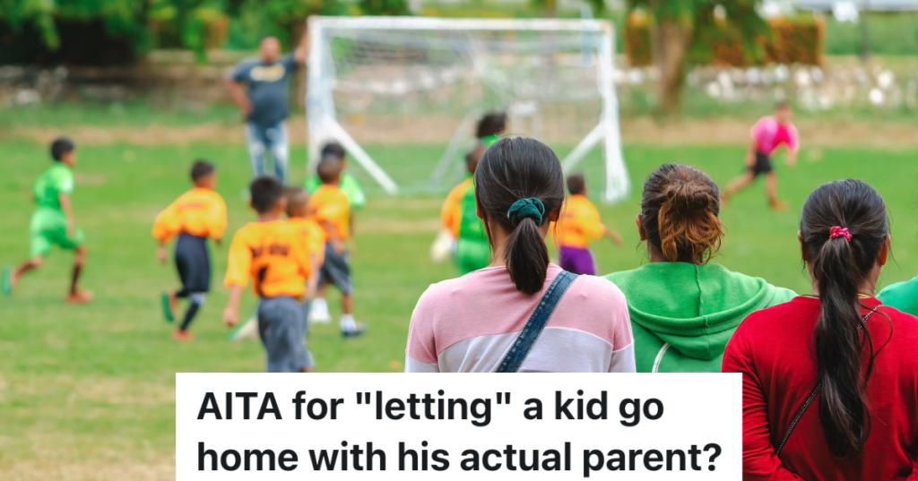 back view of parents watching kids play soccer
