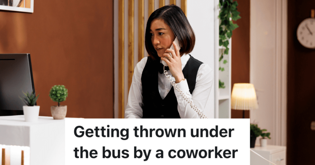 woman on the phone while working at the front desk of a hotel