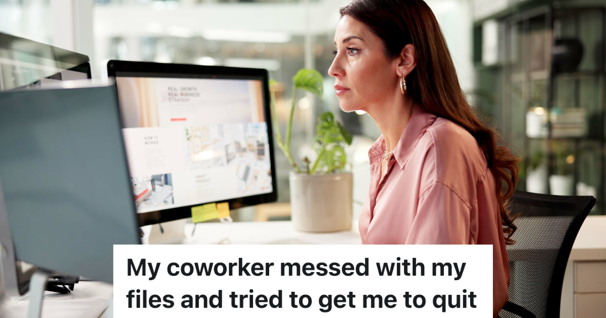 businesswoman looking at 2 computer monitors