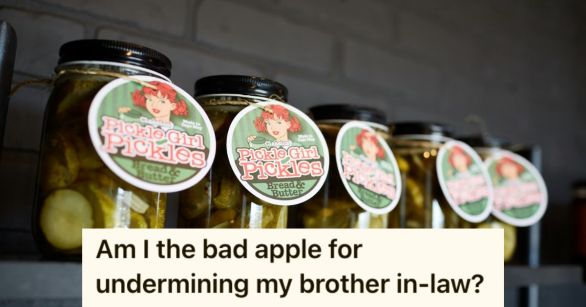 Five jars of pickles with labels on them