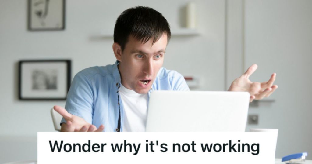 Man with a schocked reaction as he looks on his laptop