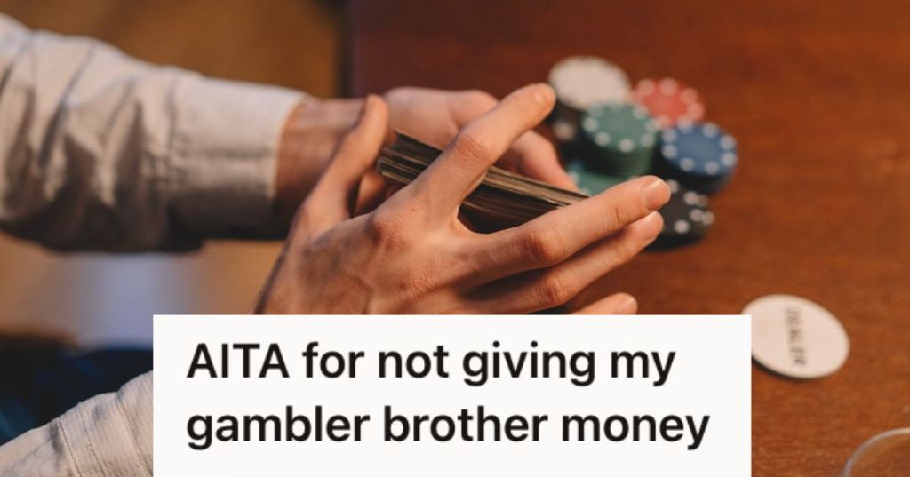 Man holding a deck of cards with casino chips on the table