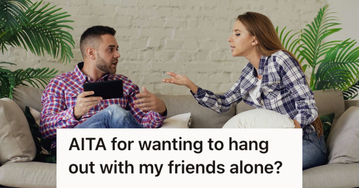 Man and woman arguing while sitting on the couch