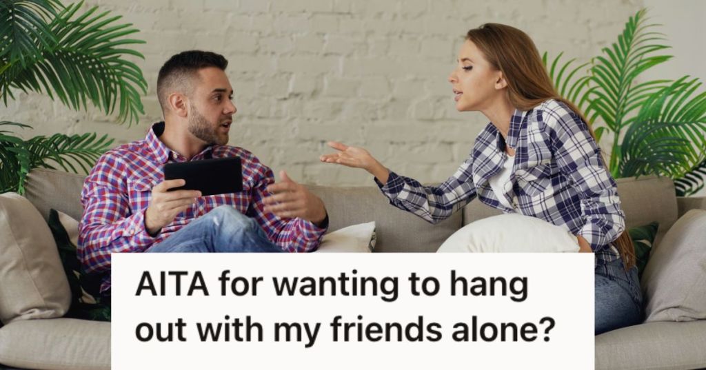 Man and woman arguing while sitting on the couch