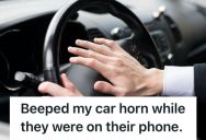 Driver Couldn’t Get Out Of His Parking Spot Because A Rude Guy Wouldn’t Close His Car Door. So He Used His Horn To Force Him To Move.