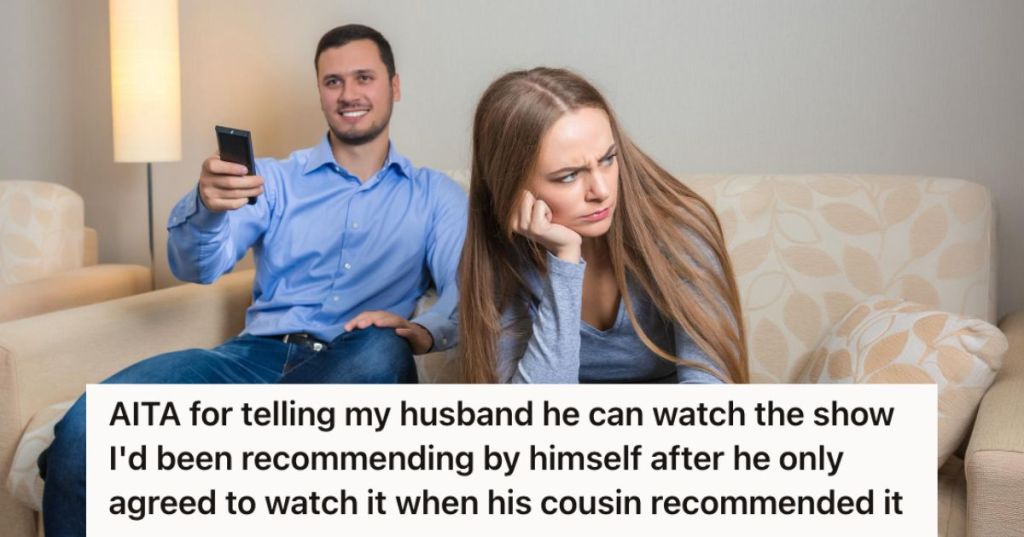 Woman is upset with the man watching TV