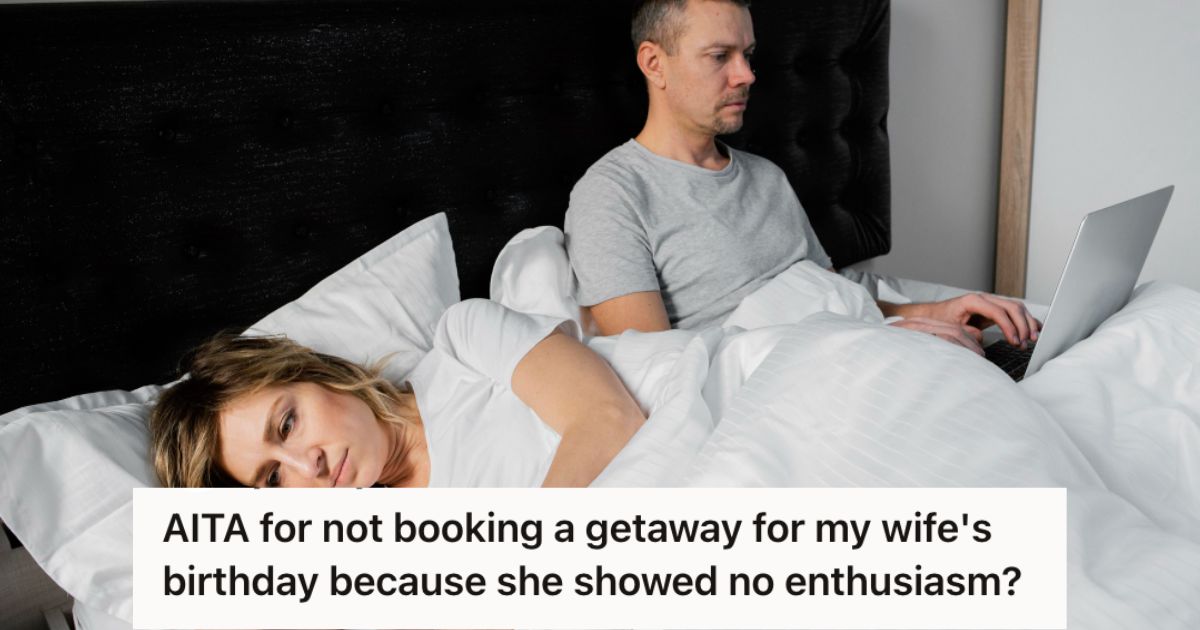 Man using his laptop in bed while his wife feels upset