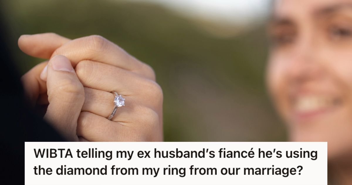 An engagement ring on a womans finger