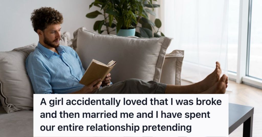 Man reading a book on the couch