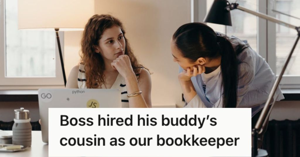 Two office workers seriously talking to each other