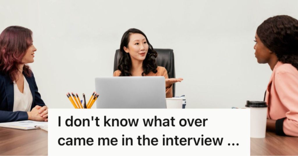 Boss talking to employees in the office