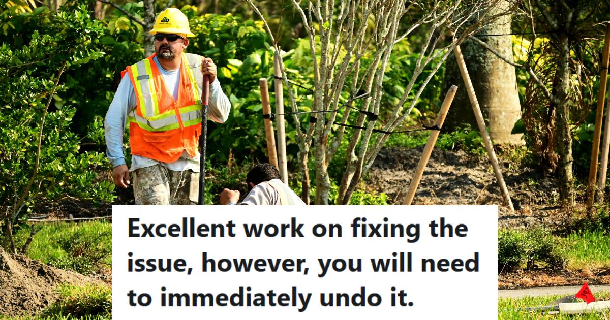 Two men outside, digging a trench to bury internet cable